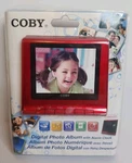 New Coby Digital Photo Album With Alarm Clock DP356 Desk Picture Frame. Fixed Price $9.99.