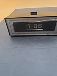 Vtg General Electric Roll Dial Flip Alarm Clock Light Model 8142-4. Fixed Price $20.99.