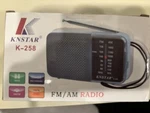 Knstar K-258 Am/fm Portable Handheld Radio, New In Box. Fixed Price $20.00.