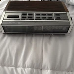 General Electric 7-4652A Digital Clock Radio Walnut Grain Am/fm Alarm Vintage. Fixed Price $19.00.