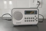 Sangean PR-D18GR Am/fm Portable Digital Radio With Protective Bumper, White/gray. Fixed Price $58.20.