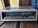 General Electric Alarm Clock Am Fm Radio Wood Grain Vintage Model 7-4651A. Fixed Price $39.99.