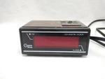 Cosmo Time Digital Alarm Clock Model E529B 4". Fixed Price $10.50.