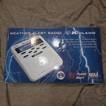 Midland WR-100 Weather Alert Radio White, Ac Adapter, Manual, Antenna, Alarm. Fixed Price $25.00.