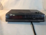 Emerson Vintage Digital Am/fm Alarm Clock Radio RED5521A Faux Woodgrain Finish. Fixed Price $12.95.