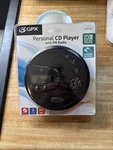 Gpx Portable Anti-skip Cd Player Fm Radio Stereo Earbuds Included, Black PC332B. Fixed Price $24.95.