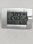 Sharper Image Radio Controlled World Time Alarm Clock. Fixed Price $8.00.