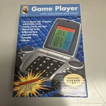 Innovage 2006 Portable Game Player With Calculator Alarm Clock Handheld. Fixed Price $20.00.