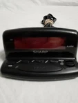 Sharp Travel Compact Alarm Clock Digital 9V Battery Backup Black Model SPC026A. Fixed Price $18.19.