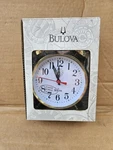 Bulova B8124 Bellman Alarm Clock, Gold. Fixed Price $40.00.
