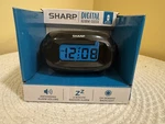 Sharp SPC500A Digital Alarm Clock Battery Operated New Sealed. Fixed Price $12.00.