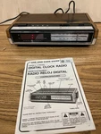 Vintage Wood Grain Digital Clock Am/fm Radio Alarm Model 7-4633D. Fixed Price $19.90.