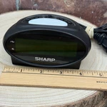 Sharp Lcd Digital Alarm Clock SPC040 Battery Backup Black Snooze Light Tested!. Fixed Price $8.50.