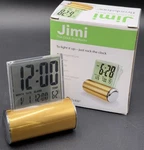 Jimi The Clock That Rocks By Brookstone Temperature Time Date Alarm Lights Gold. Fixed Price $24.26.