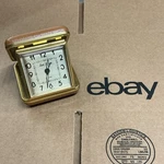 Seth Thomas Folding Travel Alarm Clock Analog Gold/brown Square Arabic Numerals. Fixed Price $45.00.
