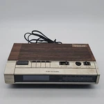 Realistic CHRONOMATIC-253 Am/fm Digital Clock Radio 12-1561 Faux Wood Parts Only. Fixed Price $8.95.
