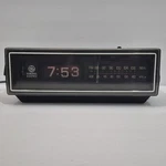 Vintage General Electric Woodgrain Rolling Clock Radio 7-4305A *parts/repair*. Fixed Price $24.95.