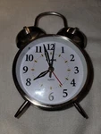 Sharp SPC800 Bedside Analog Alarm Clock Silver Quartz Battery Operated Glowing. Fixed Price $24.99.