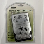 New Uninex VS-67: Retro Am-fm Radio With Rubberized Base Silver. Fixed Price $11.90.