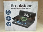 Brookstone Wireless Charger With Alarm Clock, In Box. Fixed Price $23.99.