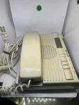 Vintage General Electric Space Saver Phone Am/fm Radio Alarm Clock 2-9711A Beige. Fixed Price $30.00.