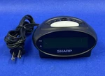 Sharp Lcd Digital Alarm Clock SPC040 Battery Backup. Fixed Price $11.97.
