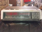 Vintage General Electric 7-4676A Alarm Clock Radio Walnut Grain. Fixed Price $29.99.