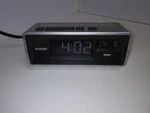 Sharp Vintage Electric Alarm Clock Model #spc 498. Fixed Price $14.00.