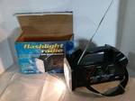 Vintage Curtis Flashlight Radio/ Instant 7 Weather Band Frequencies/ Am/fm Works. Fixed Price $40.00.