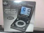 Sharper Image World Travel Folding Alarm Clock 18 Cities ST992 #8888 Factory Sea. Fixed Price $14.95.