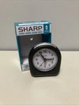 Sharp Quartz Analog Alarm Clock Black SPC844A (includes Battery). Fixed Price $9.99.