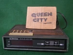 Vintage Emerson Red-lcd Alarm Clock/am-fm Radio W/woodgrain Case 1980S Works. Fixed Price $24.00.