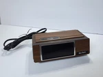 Vintage Ken-tech Simple Digital Alarm Clock Model V20959 Wood Grain Blue Numbers. Fixed Price $16.99.