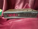 Emerson RED5675A Wood Grain Dual Alarm Clock Am/fm Radio With Battery Back Up. Fixed Price $15.00.