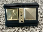 Vintage Folding Transistor Am -fm Clock Radio. Fixed Price $30.00.