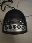 Snooze Dimmer Alarm Clock Am/fm Radio Black Zenith Z1233BA. Fixed Price $19.99.