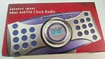 Sharper Image Mini Digital Am/fm Clock Radio Alarm GM107 # 9821. Fixed Price $19.95.