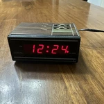 Vintage Cosmo Time Digital Led Alarm Clock Model E529B W/ Walnut Grain Look. Fixed Price $10.00.