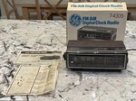 Vintage General Electric Clock Radio Walnut Grain Model 7-4305C With Box!. Fixed Price $209.99.