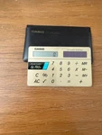 Vintage Casio SL-760C Film Card Solar Powered Credit Calculator & Holder. Fixed Price $27.00.