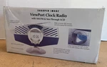 Sharper Image Viewport Clock/radio With Am/fm & See-through Lcd. Fixed Price $14.00.