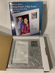 Sharper Image Talking Picture 2-WAY Frame W/ Message, Alarm Clock & Temperature. Fixed Price $17.99.