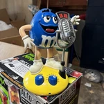 M&ms Blue Character Am/fm Radio W/built In Speaker And Animated No Bat Cov. Fixed Price $12.00.