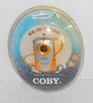 Nos Coby CX-71 Mini Am/fm Pocket Radio W/headphones Orange S16. Fixed Price $11.99.