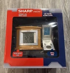 Sharp Tech Atomic Lcd Desk Clock & Travel Alarm SPC324SC Brand New Nip. Fixed Price $24.99.
